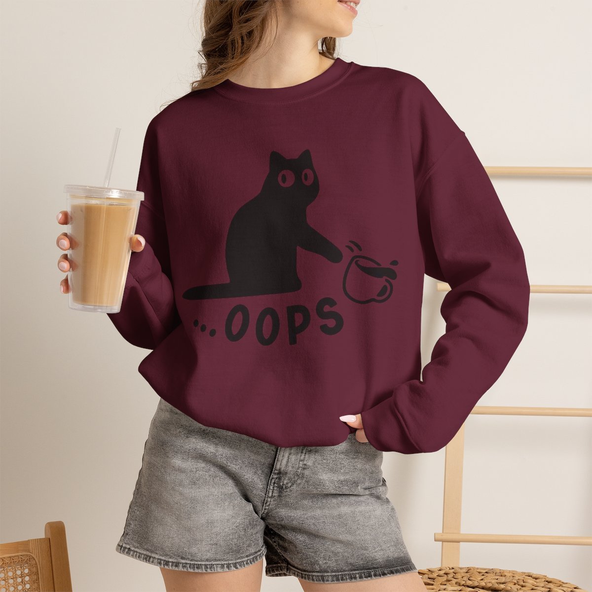 Funny Black Cat Knocking Over Coffee Cup Unisex Sweatshirt | Cat Lover Gift Maroon